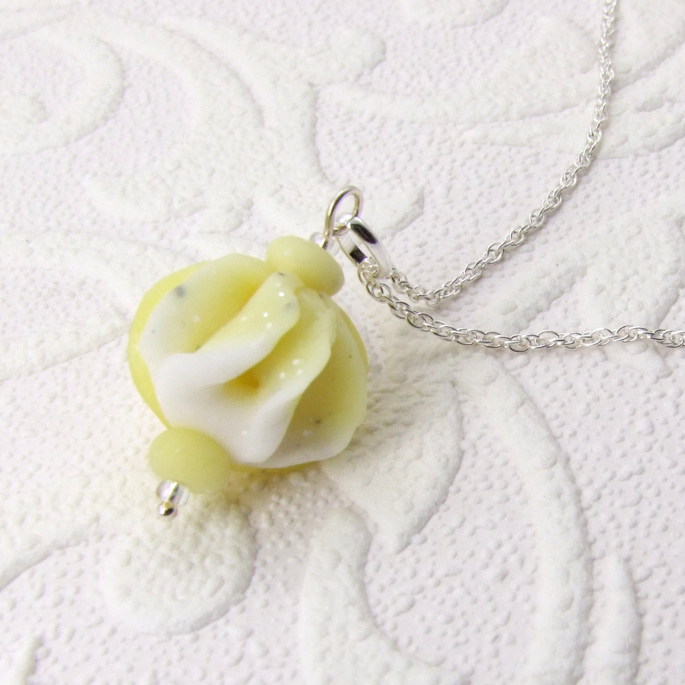 seedpod inspired polymer clay pendant on silver chain